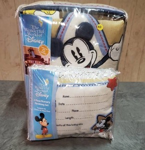 lot 52 image: Disney Mickey Mouse 4-piece bedding set, pillow and dust ruffle.  Never opened.