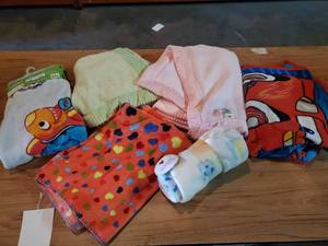 lot 147 image: Disney Cars Sesame street and other brands plush toddler blankets, Never used