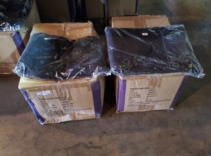 lot 161 image: 2 boxes of solid black 100% cotton t-shirts. Size medium.