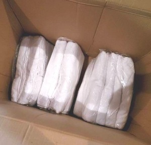 lot 166 image: Box of white plush bath towels.