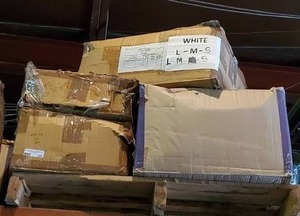 lot 196 image: Pallet of white 100% cotton t-shirts.  Various sizes. 6 cases. Bid is times the quantity