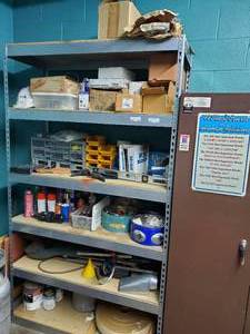 lot 208 image: Contents of shelf.  Includes parts bins, electrical goods, Husky socket set, pneumatic nozzles & connectors, spray paint and MUCH more.  Shelf not included.