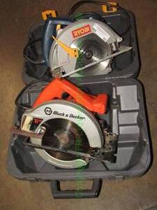 lot 29 image: Ryobi and Black & Decker circular saws in storage cases