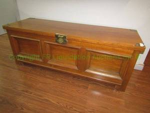 lot 619 image: Solid teak wood with brass trim storage chest 59 x 21 x 20