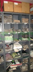 lot 436 image: Assorted fabric samples and remnants contents of shelving unit. Shelving unit not included