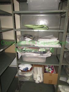 lot 472 image: Assorted fabric samples and remnants contents of shelving unit. Shelving unit not included