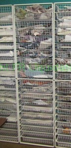 lot 457 image: Wire frame storage drawer unit 82 x 22 x 21 and contents of fabric samples & remnants
