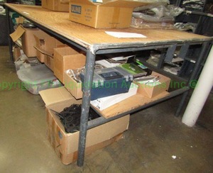 lot 480 image: Metal base wood top utility table, contents not included. 31 x 83 x 46