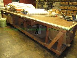 lot 557 image: Large utility table, custom built 215 X 74 X 36, THIS TABLE WILL NEED TO BE DISASSEMBLED TO REMOVE