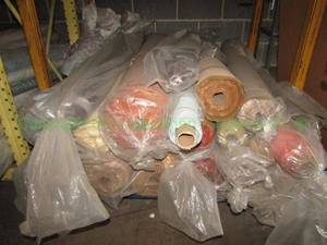 lot 366 image: Large selection of fabric rolls. Generous quantity. Patterns vary.