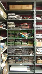 lot 497 image: Assorted fabric samples and remnants contents of shelving unit. Shelving unit not included