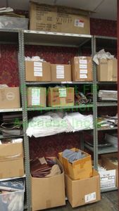 lot 503 image: Assorted fabric samples and remnants contents of shelving unit. Shelving unit not included