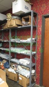 lot 520 image: Assorted fabric samples and remnants contents of shelving unit. Shelving unit not included