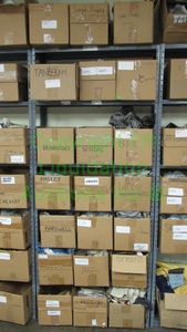 lot 530 image: Assorted fabric samples and remnants contents of shelving unit. Shelving unit not included