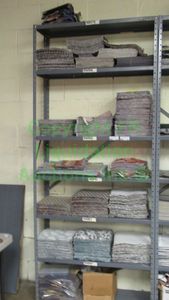 lot 540 image: Assorted fabric samples and remnants contents of shelving unit. Shelving unit not included