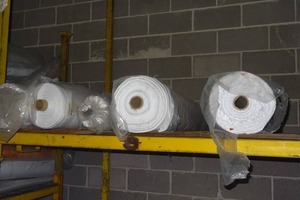lot 277 image: Large rolls of white fabric