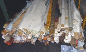 lot 292 image: Large selection of fabric rolls.  Generous quantity.  Patterns vary.