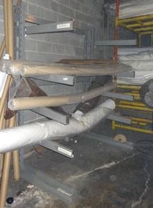lot 295 image: Single sided cantilever rack.  Measures 96 x 80 x 45.  Contents not included.