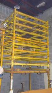 lot 305 image: 6 portable pallet stack racks.  Buyers choice.  First come, first serve. Contents not included. Bid is times the quantity