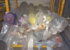lot 315 image: Large selection of fabric rolls.  Generous quantity.  Patterns vary.