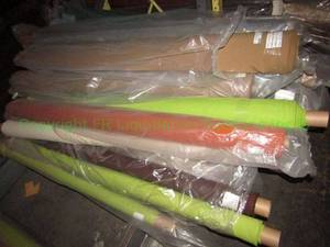 lot 574 image: Large selection of fabric rolls. Generous quantity. Patterns vary.