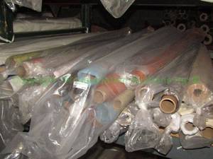 lot 575 image: Large selection of fabric rolls. Generous quantity. Patterns vary.