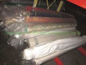 lot 580 image: Large selection of fabric rolls. Generous quantity. Patterns vary.