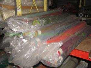 lot 582 image: Large selection of fabric rolls. Generous quantity. Patterns vary.