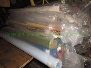 lot 583 image: Large selection of fabric rolls. Generous quantity. Patterns vary.