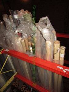 lot 584 image: Large selection of fabric rolls. Generous quantity. Patterns vary.