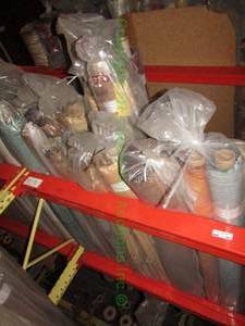 lot 593 image: Large selection of fabric rolls. Generous quantity. Patterns vary.