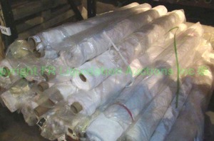 lot 564 image: Large lot of assorted white fabric rolls