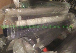 lot 596 image: Large selection of fabric rolls. Generous quantity. Patterns vary.