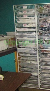 lot 459 image: Wire frame storage drawer unit 82 x 22 x 21 and contents of fabric samples & remnants