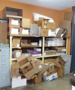 lot 689 image: Assorted shipping supplies and shelving unit as shown