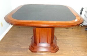 lot 698 image: Wood & leather square table w pedestal base. Measures 48 x 48 x 32