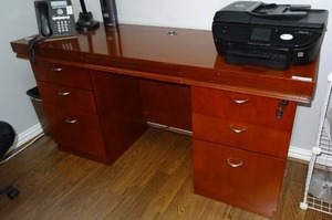 lot 701 image: Wooden office desk credenza.  Contents not included.  Measures 63 x 32 x 24