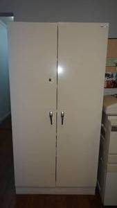 lot 705 image: Metal cabinet w contents.  Measures 36 x 72 x 19.