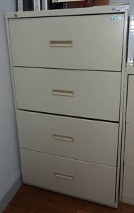lot 714 image: HON lateral file cabinet w 4 drawers.  Measures 30 x 53 x 19.  Contents not included.