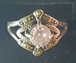 lot 26 image: Sterling Ring with Pale Pink Gemstone Setting