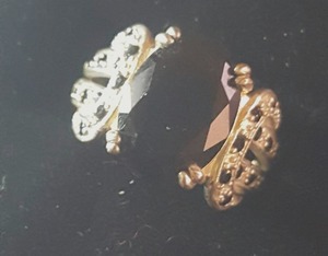 lot 27 image: Sterling Ring with Black Stone and Buckle Accents