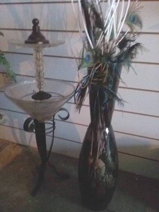 lot 158 image: Tall Smoked Glass Floor Vase with Arrangement with Peacock Feathers and Unique Iron &amp Glass Planter