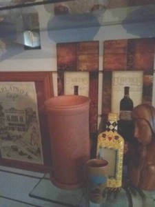 lot 176 image: Wine Theme Dcor( Terra Cotta WIne Cooler, Wall Plaques, Frame, more)