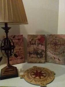 lot 202 image: Compass Theme Dcor(Lamp,3 canvases, and wall plaque)