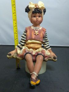 lot 15 image: Colletable  Figurine Little Girl Sitting Down