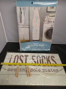 lot 20 image: Kathy Davis Supreme Ironing Board Cover And Pad And Lost Socks Wall Sign