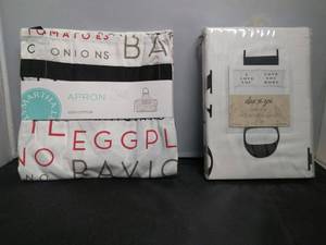 lot 21 image: New Martha Stewart Collection Apron And Alex and Zoe PillowCases