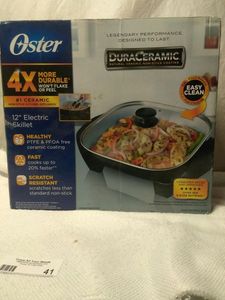lot 41 image: NEW OSTER 12 ELECTRIC SKILLET