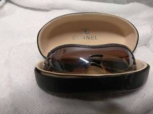 lot 42 image: CHANEL SUN GLASSES