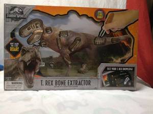 lot 50 image: NEW JURASSIC WORLD T. REX BONE EXTRACTOR
